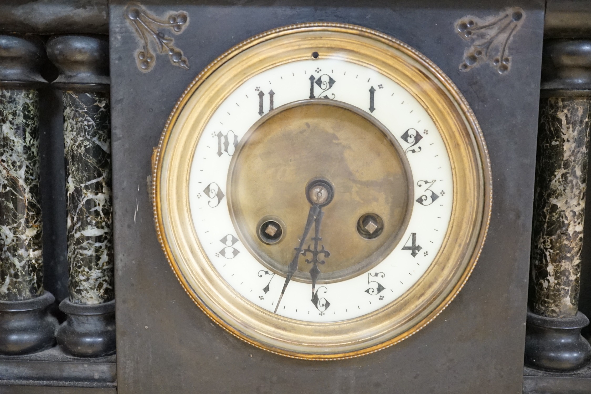 A Victorian black slate and marble architectural mantel clock, 38cm wide